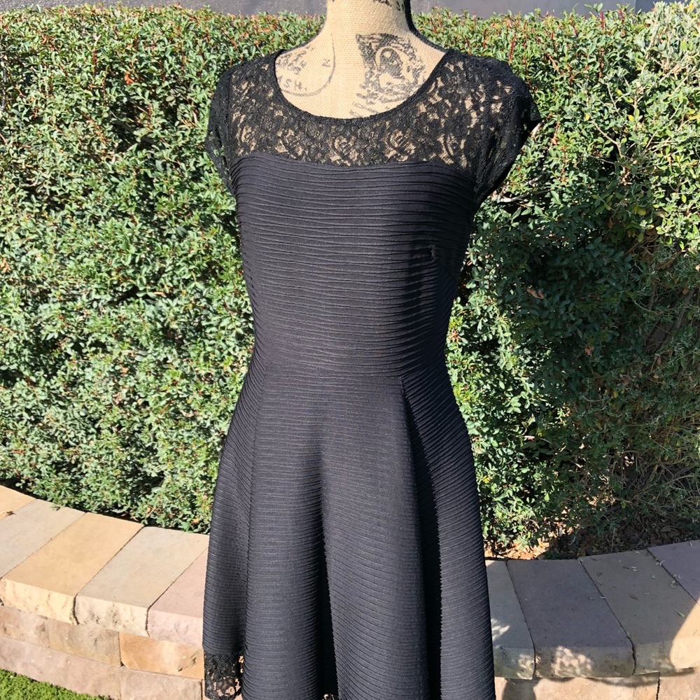 NWT- Black dress with lace detail.